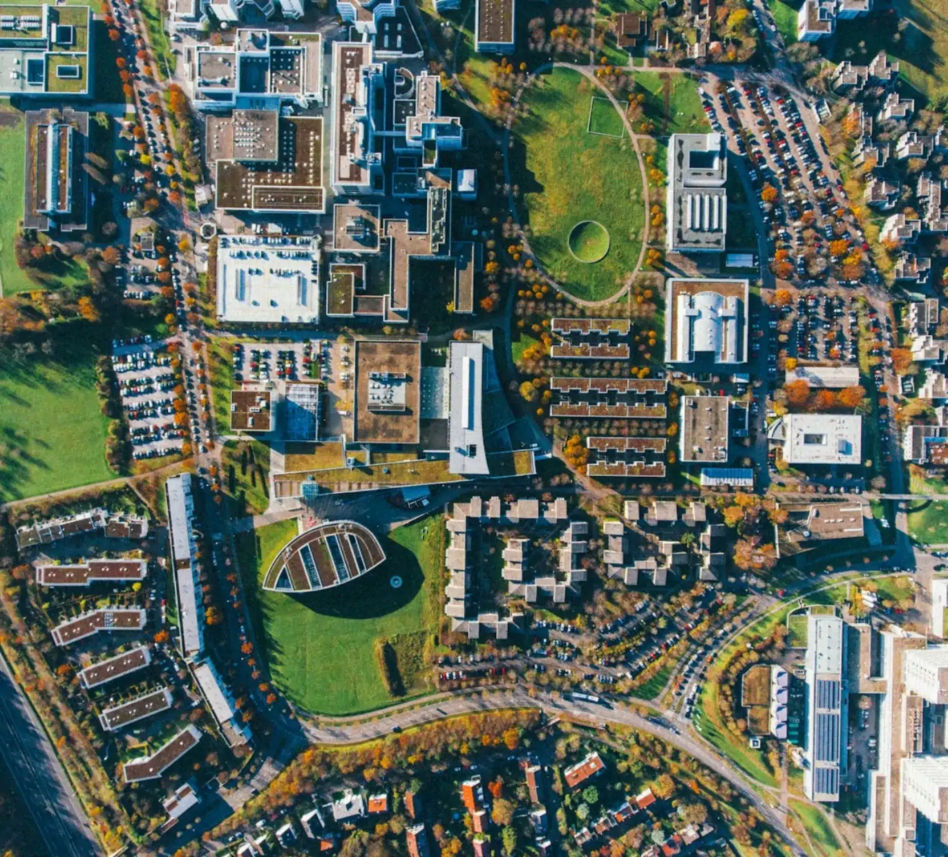 Overhead view of modern university campus with buildings and greenspace